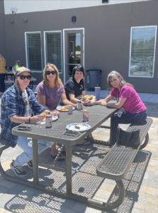 group of residents enjoying a community BBQ at Marvel Way sober living apartments in Reno, NV