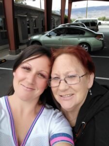 krystal and her mom in the empowerment center parking lot